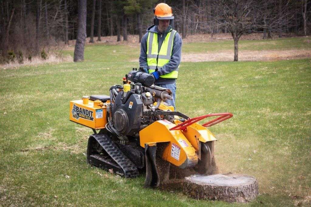 Top’em & Drop’em removed a tree stump with a grinder to prep a yard for sod in Deltona, Florida.