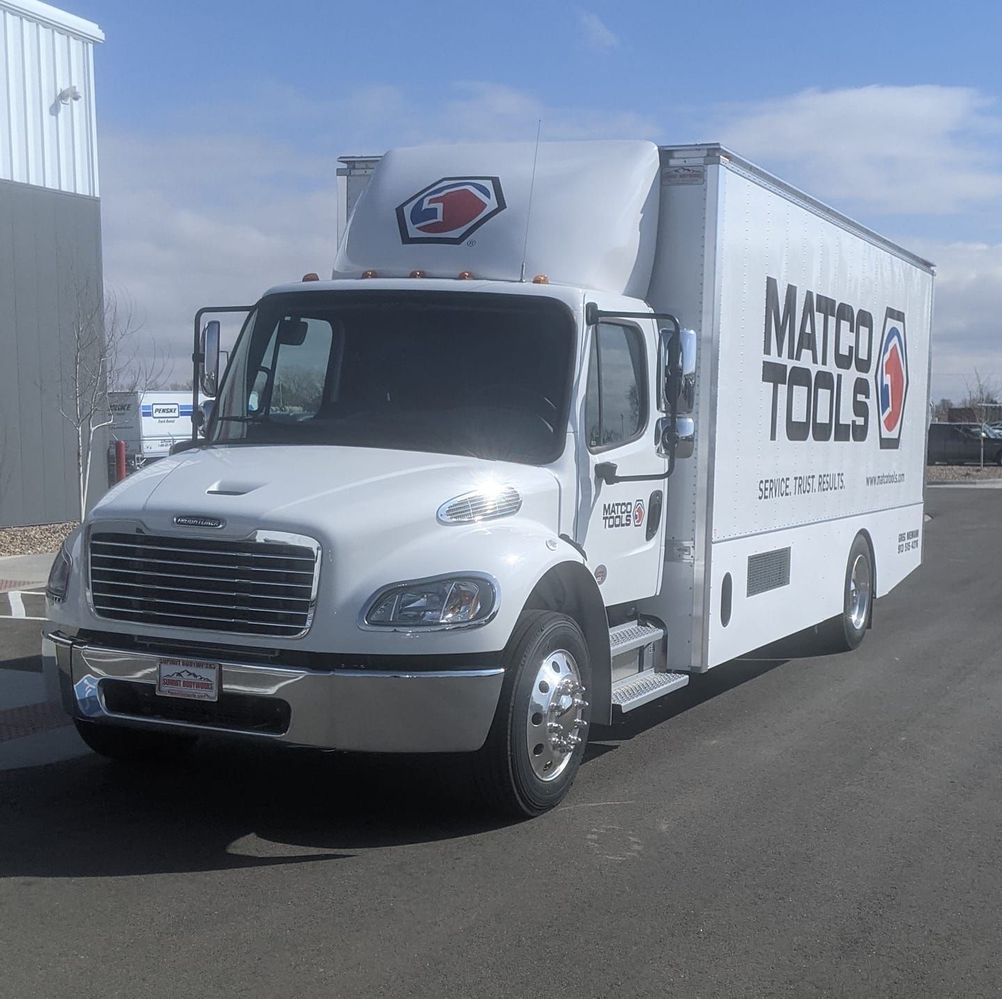White Matco Tools delivery truck parked on a sunny road