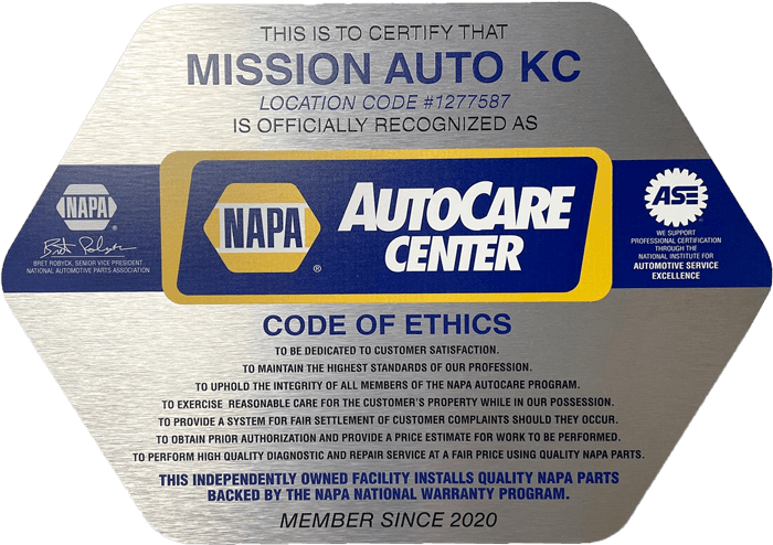 NAPA AutoCare Center Code of Ethics plaque for Mission KC, silver and blue with yellow NAPA logo
