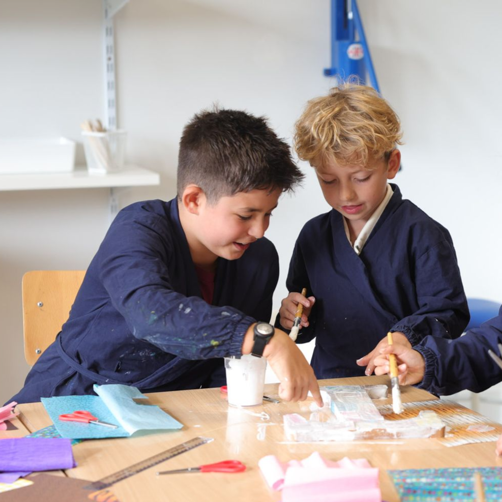 A pupil with a teacher in pre-reception.