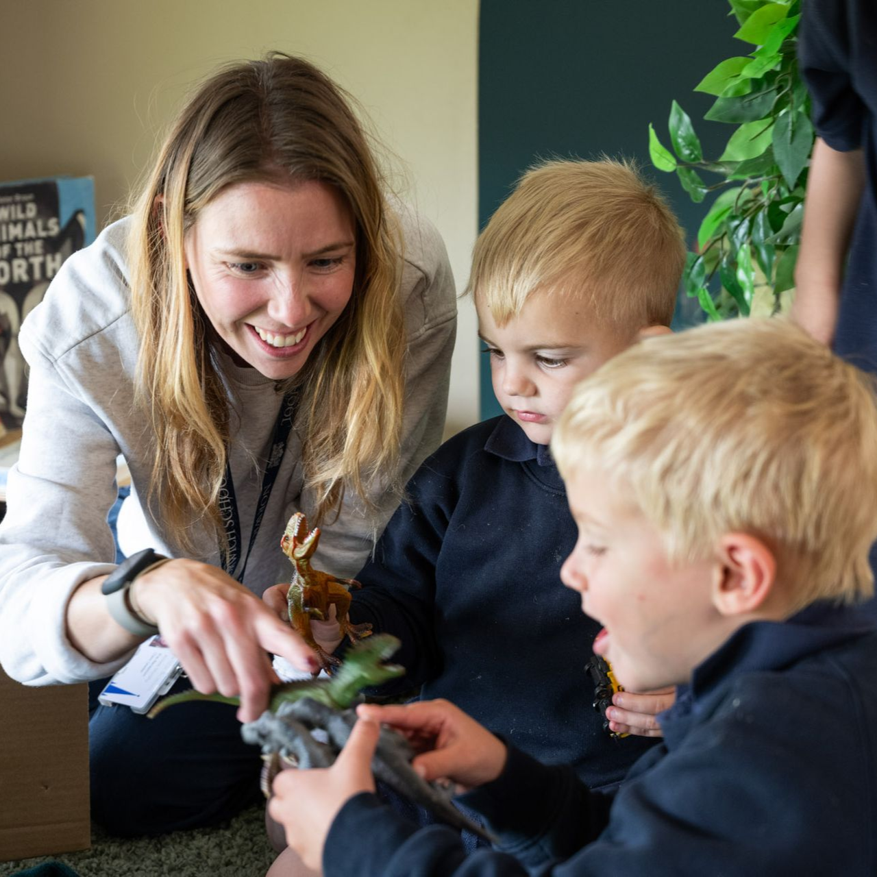 A pupil with a teacher in pre-reception.