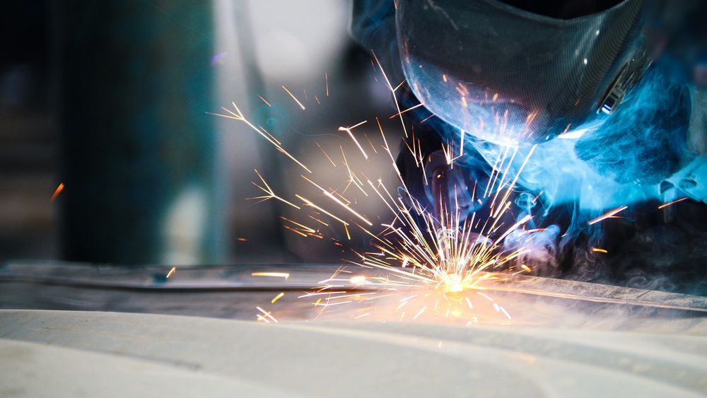 Welder In Action With Bright Sparks — Weldcro Fabrication in Ballina, NSW