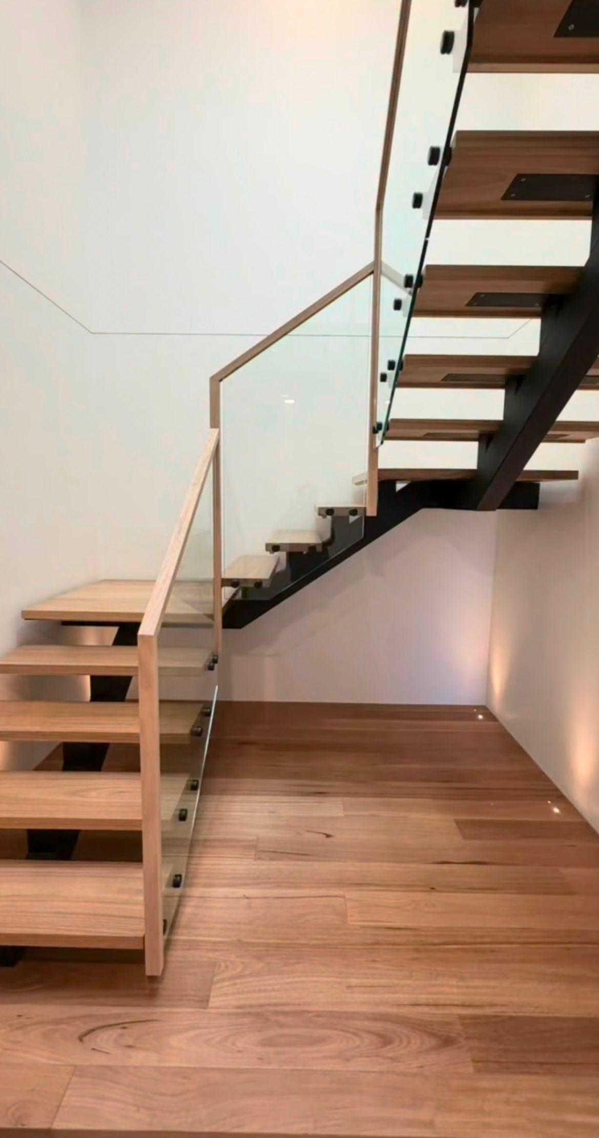Wooden Staircase with Black Steel Supports — Weldcro Fabrication in Ballina, NSW