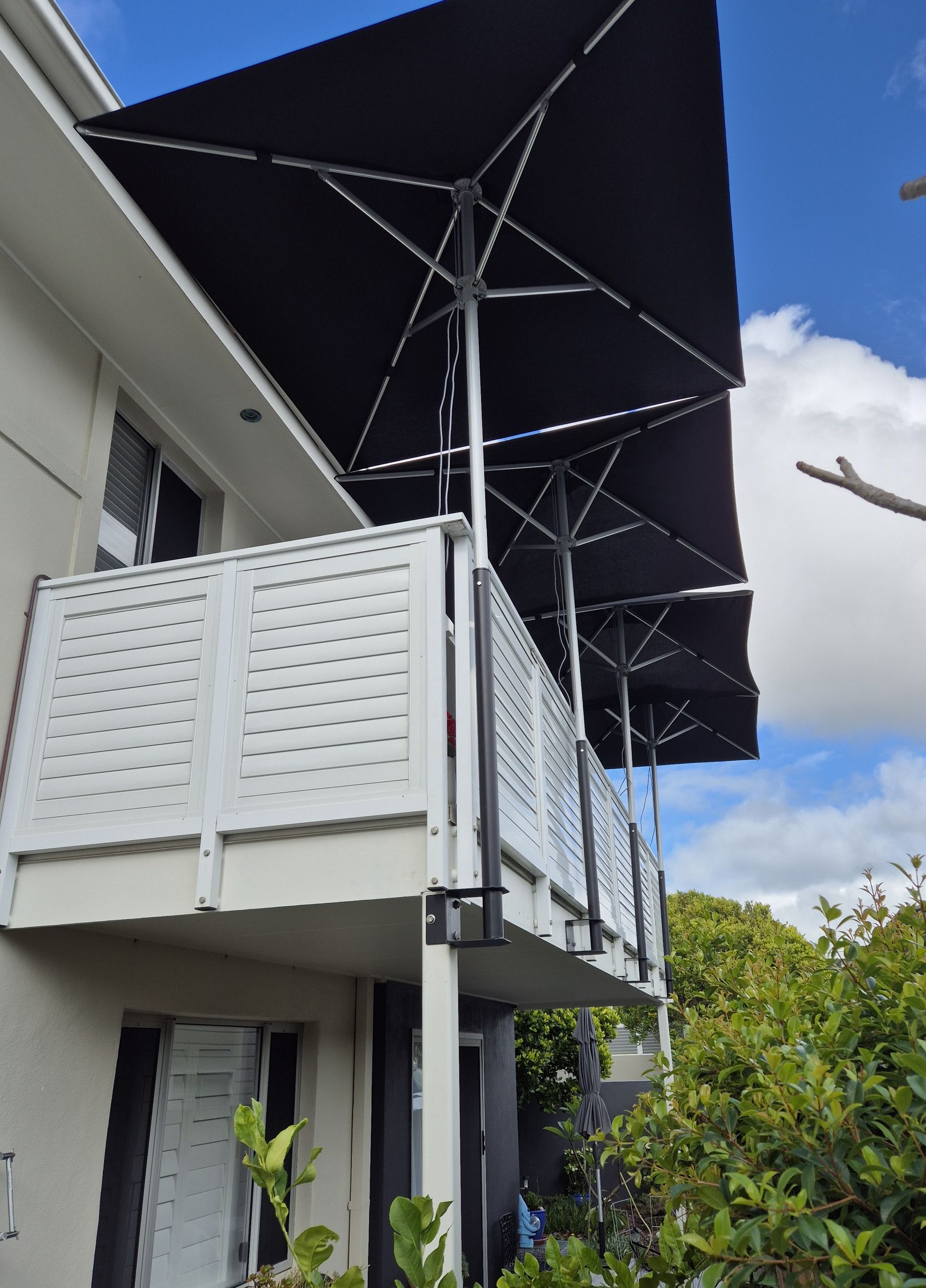 Modern Balcony with Metal Louvered Sides and Awnings — Weldcro Fabrication in Ballina, NSW