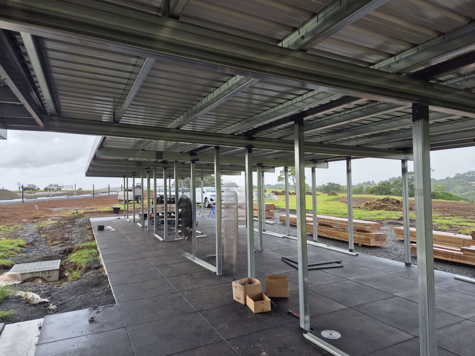 Stack Of Metal Sheets In Warehouse — Weldcro Fabrication in Ballina, NSW