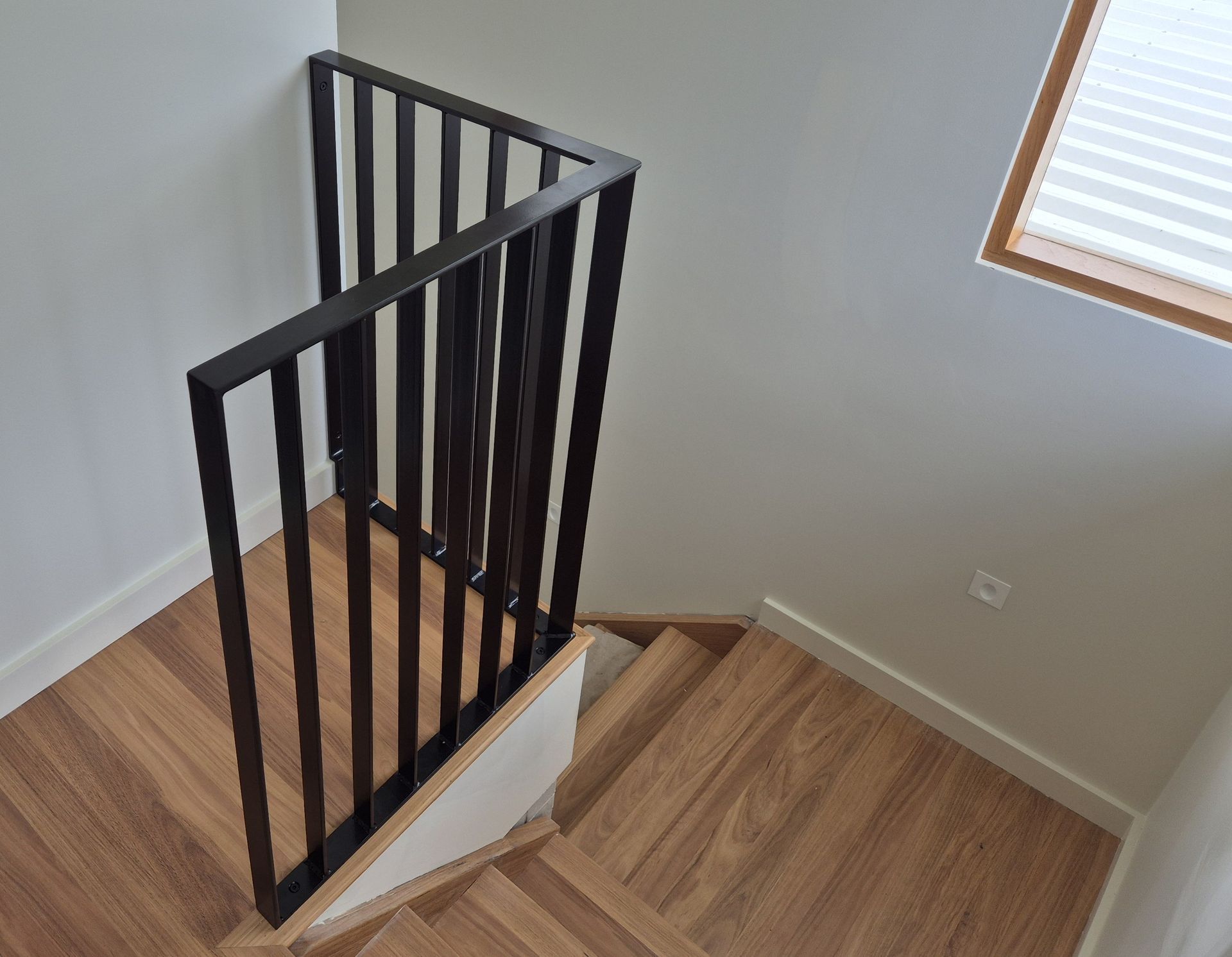 Stairwell with Black Metal Railings — Weldcro Fabrication in Ballina, NSW