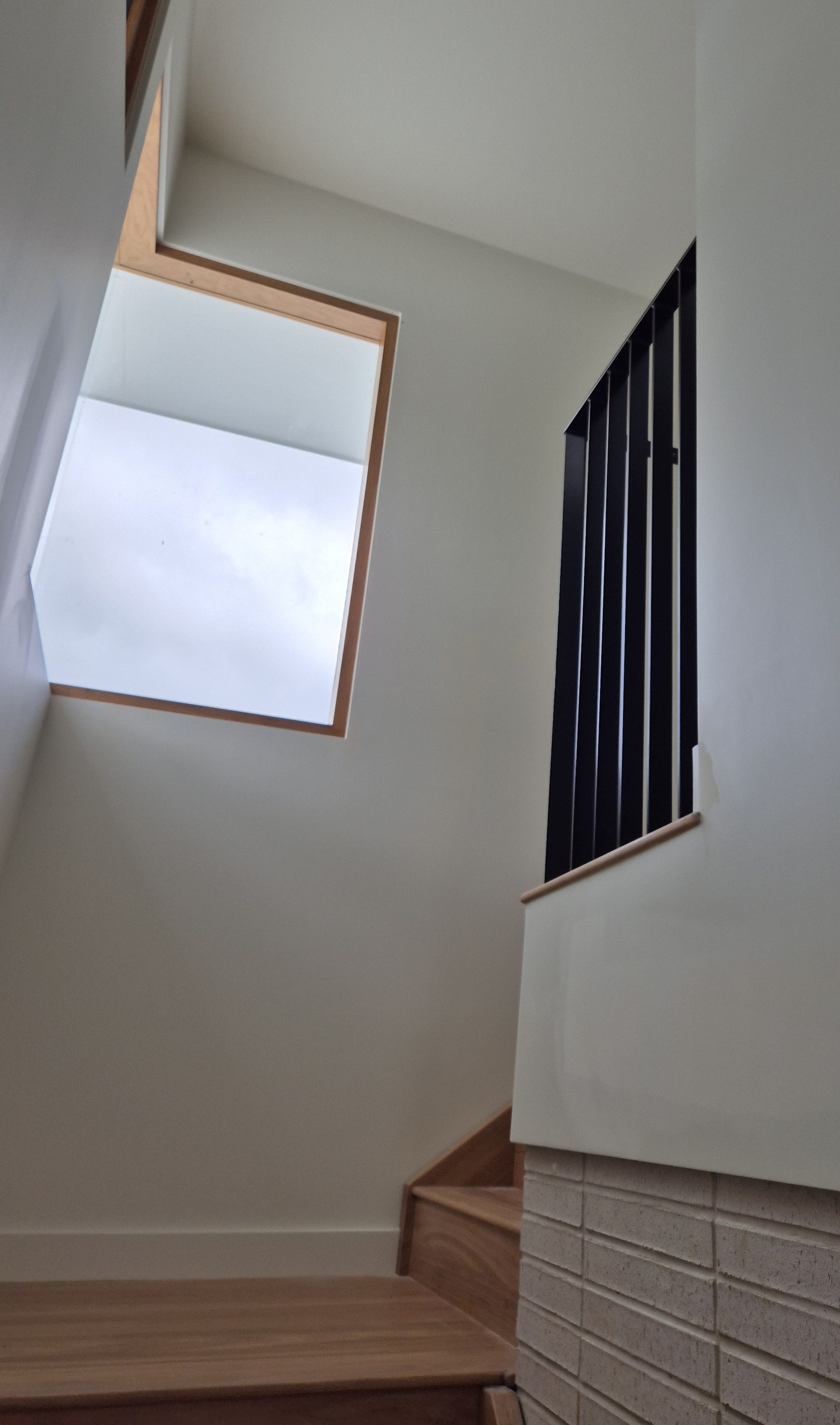 Stairwell with White Walls, Wood Steps, a Frosted Window — Weldcro Fabrication in Ballina, NSW