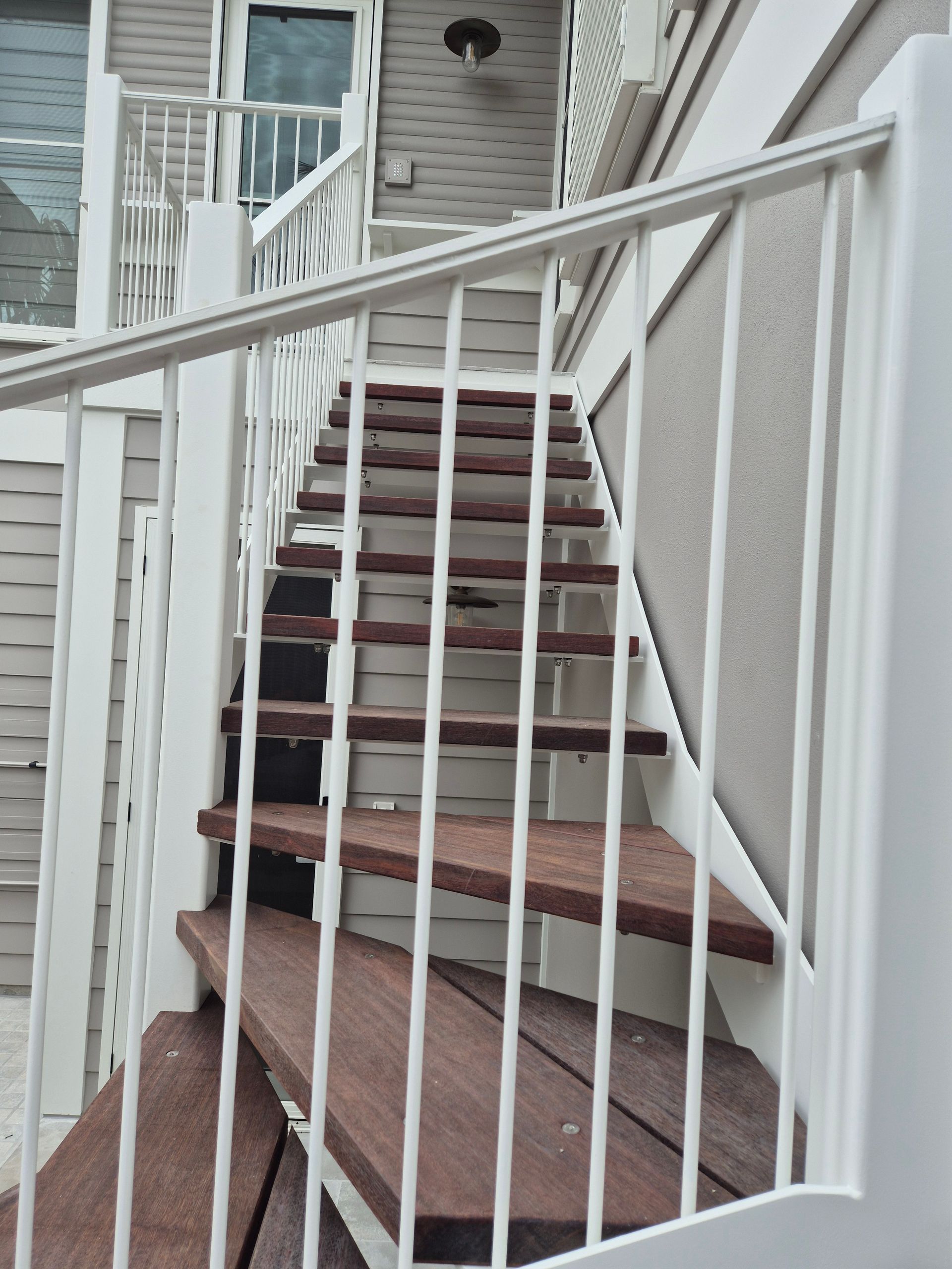 Outdoor Staircase with White Metal Railings — Weldcro Fabrication in Ballina, NSW