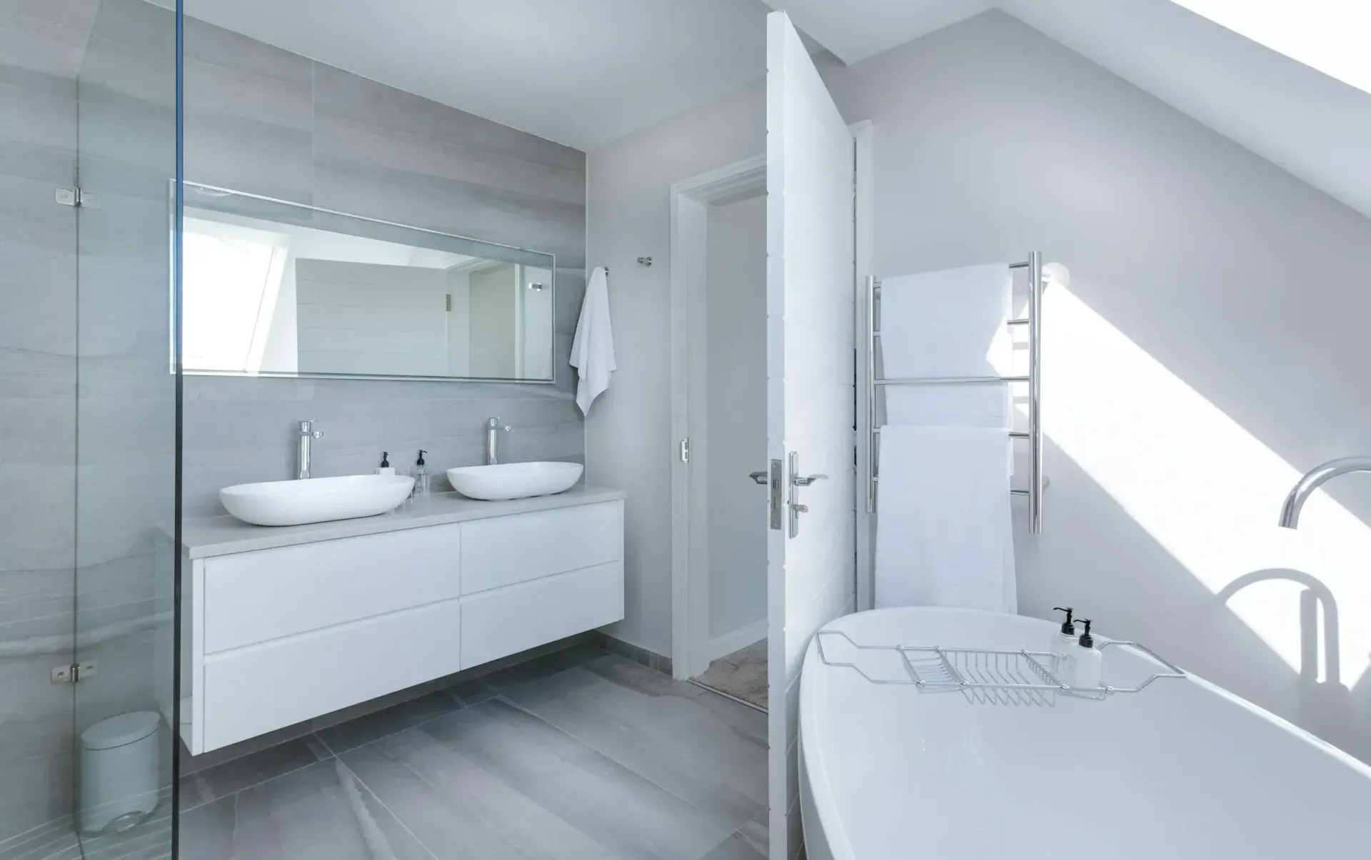 A Bathroom with Two Sinks, and A Bathtub — Affordable Tiling & Waterproofing in Kirwan, QLD