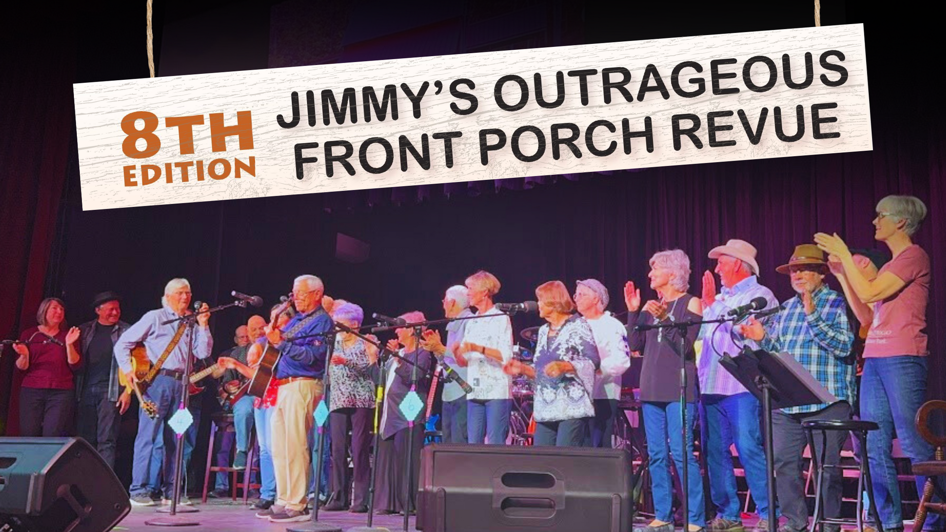 Stage performers under a banner reading “8th Jimmy’s Outrageous Front Porch Revue” sing and play instruments.