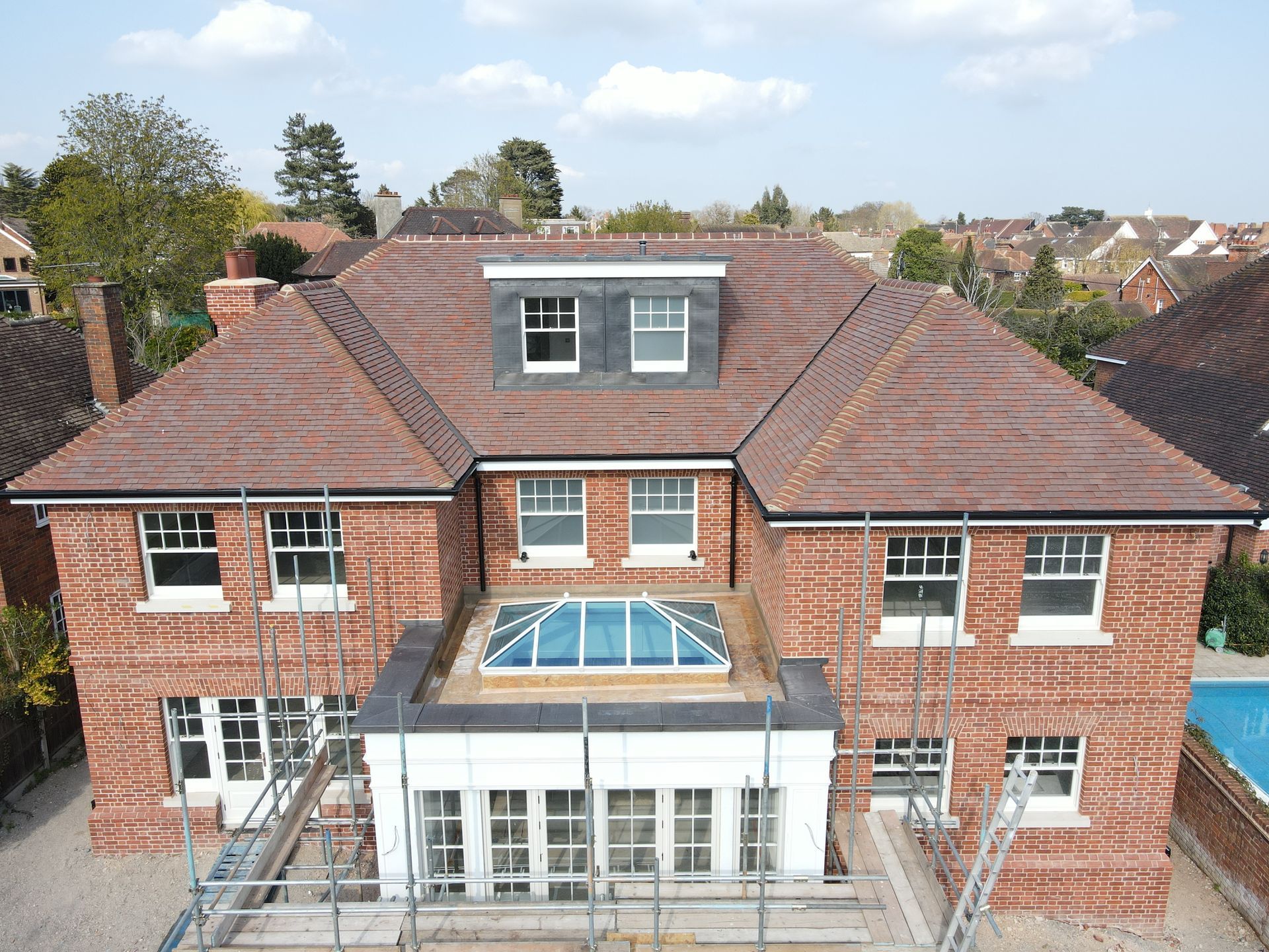 Large build roof with landmade clay tiles and lead dormer