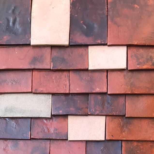Plain roof tiles with red and orange shades