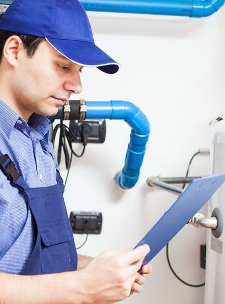 Anchor HVAC technician servicing an indoor air handler unit