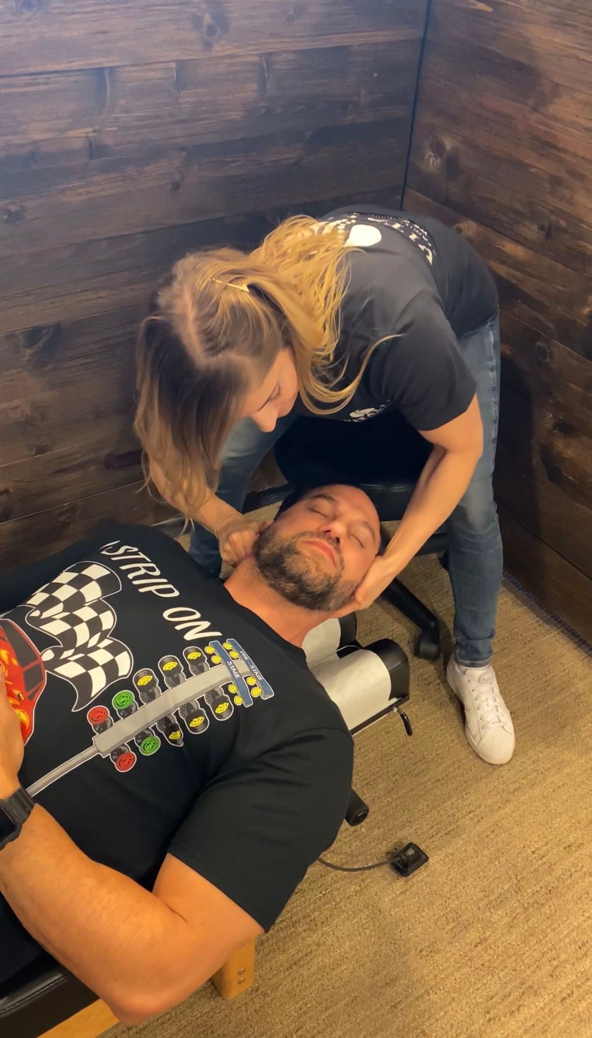 Chiropractor adjusting patient's neck