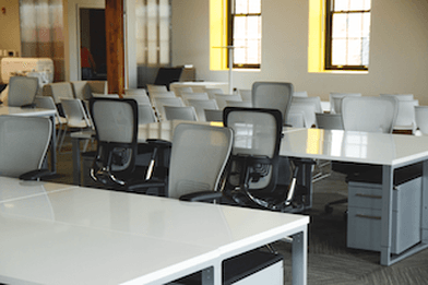 Commercial cleaners in Hastings, office looking clean and tidy with chairs tucked under desks and empty