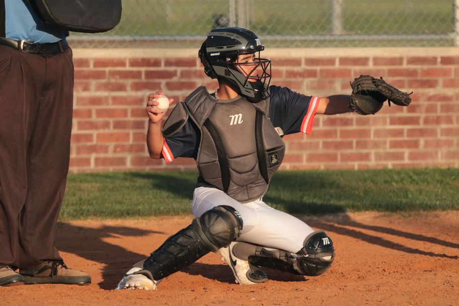 Baseball player at full swing, cinematic action shot