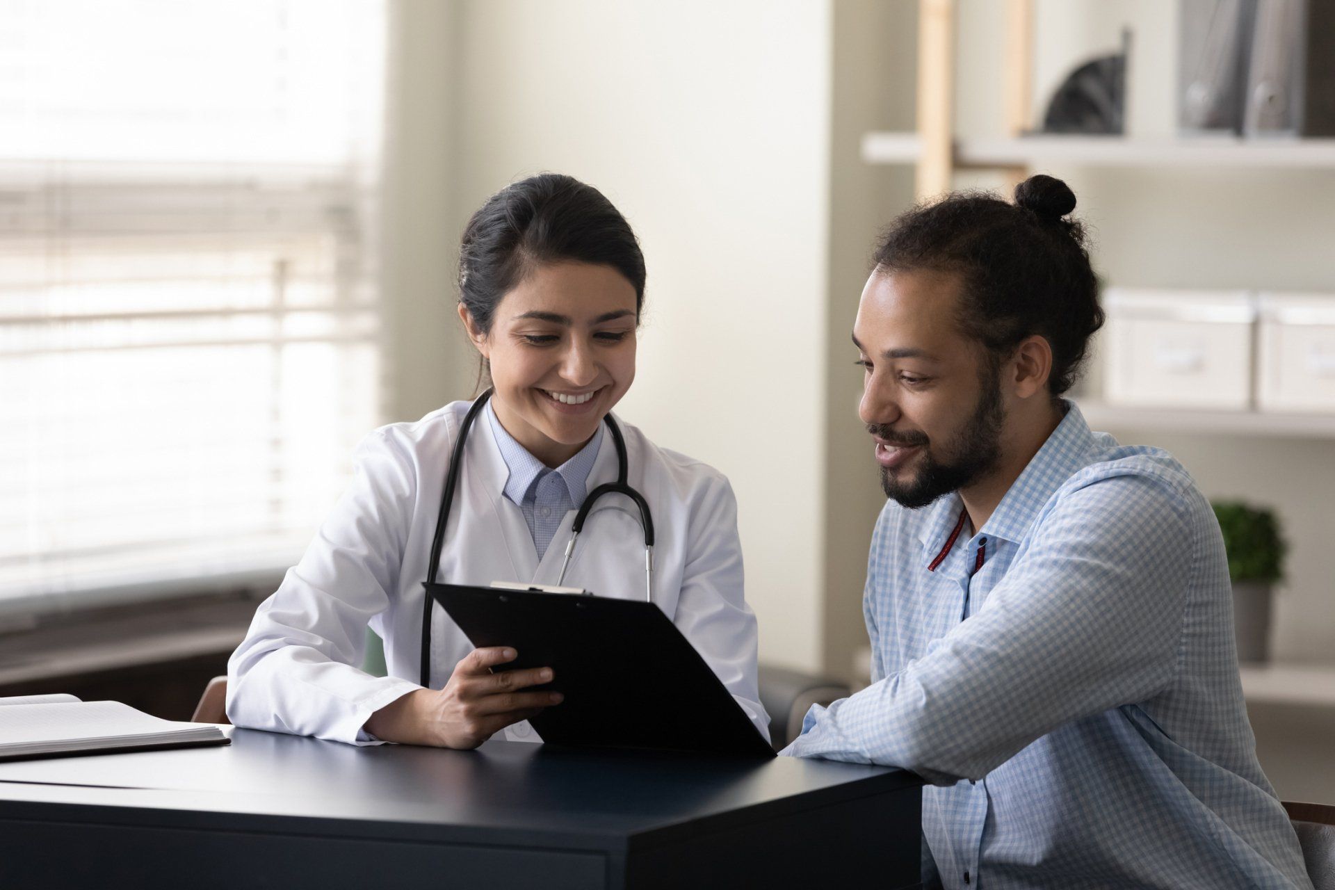 Doctor Discussing Treatment With Patient — St. Marys, GA — Coastal Wellness Family Medicine