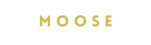 gold spaced out lettering of the word moose