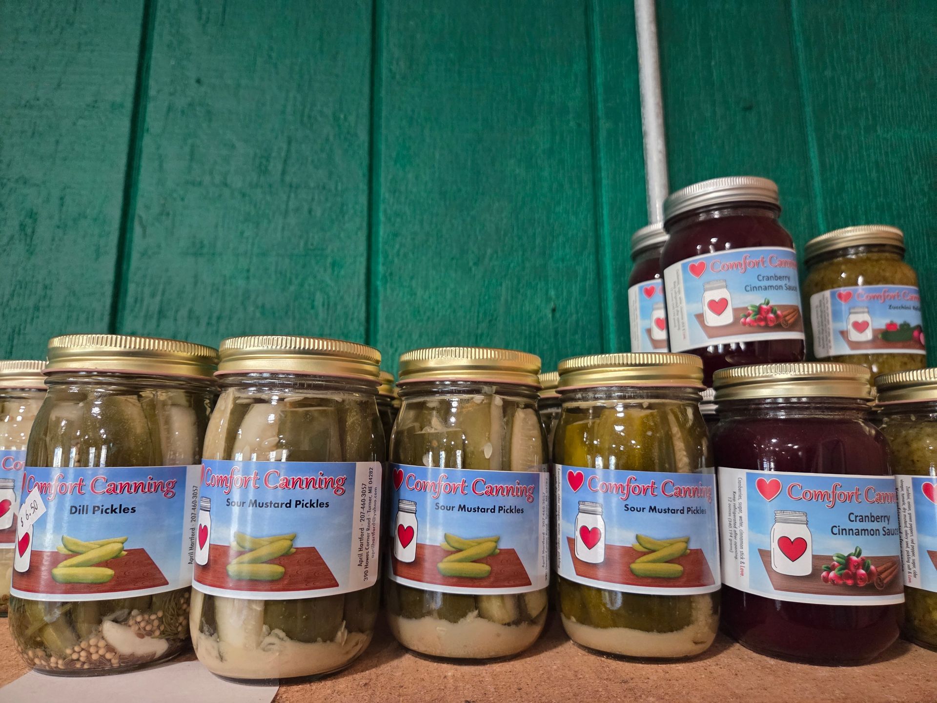 Jars of pickles and pickled beets with 