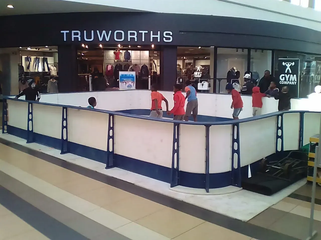 Synthetic ice rink hire Gauteng – 8m portable rink with skates and operator, SA Inflatables