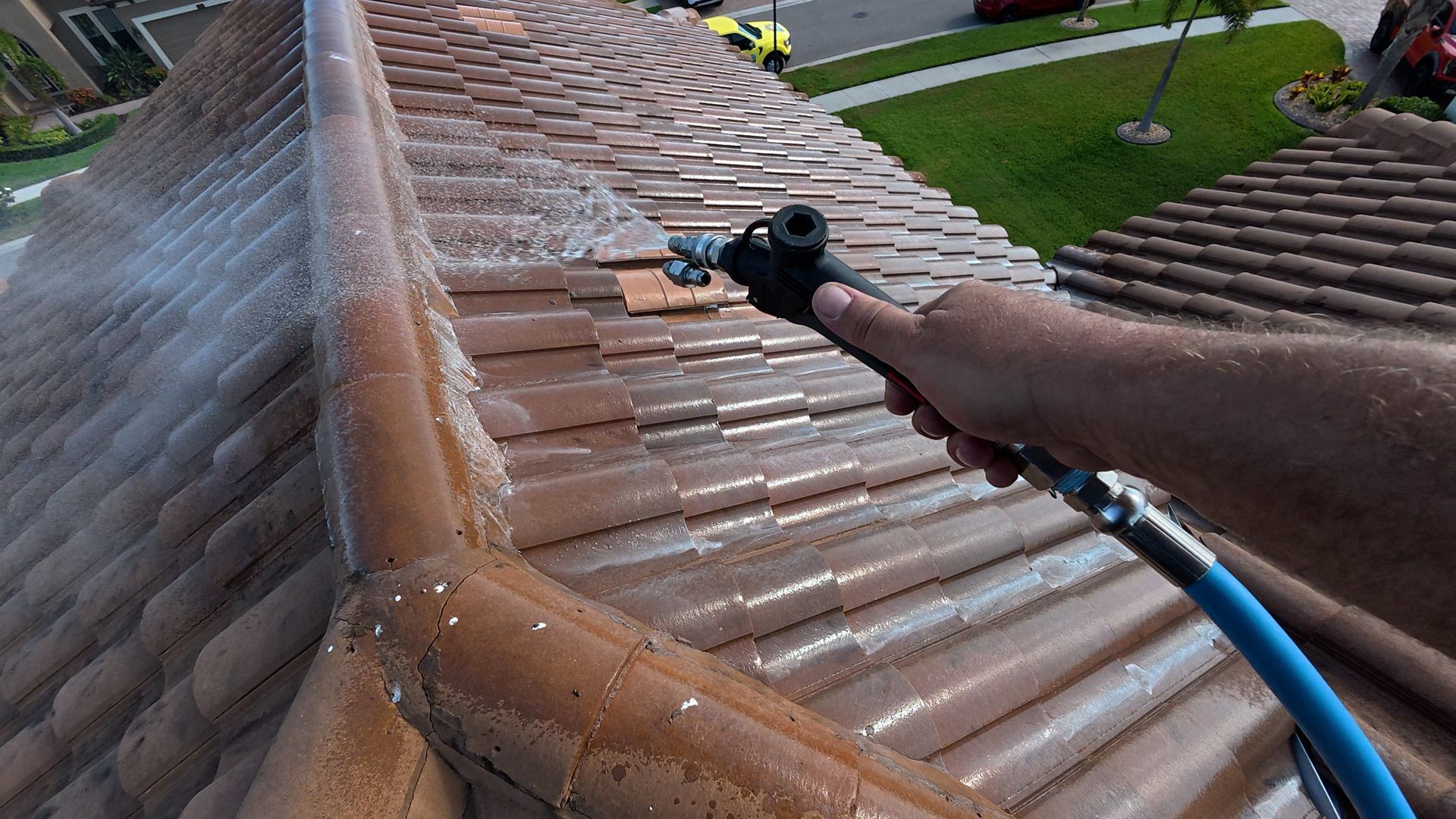 Soft washing a tile roof