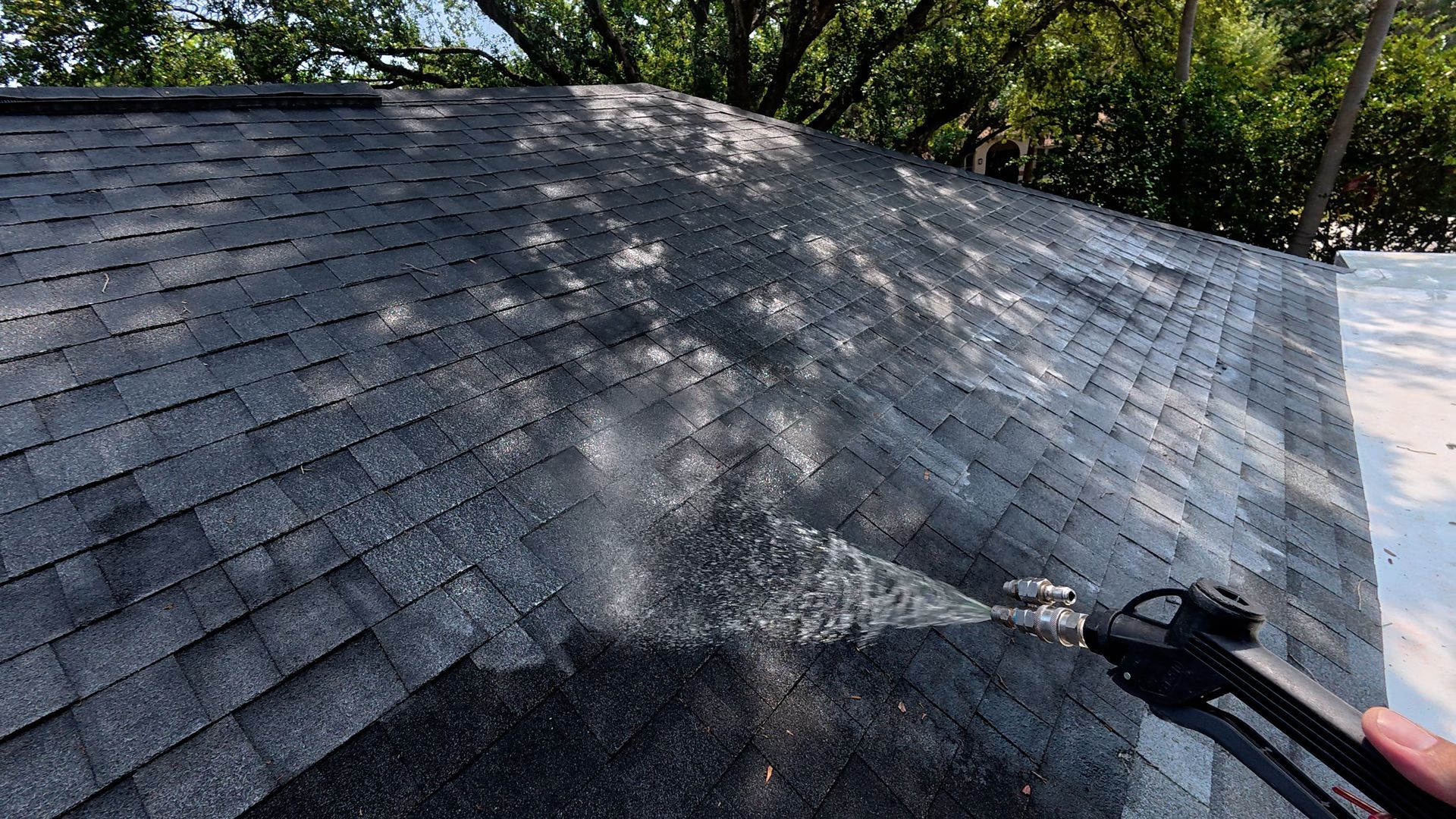 Soft washing a shingle roof