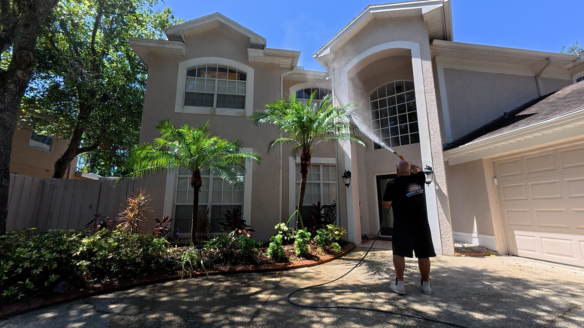 Soft washing a house in Tampa