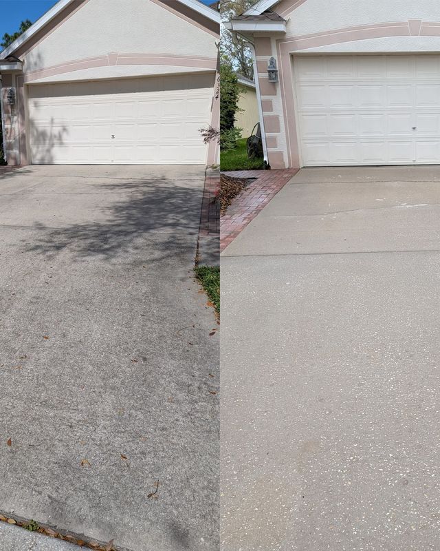 A pressure washer cleaning a surface