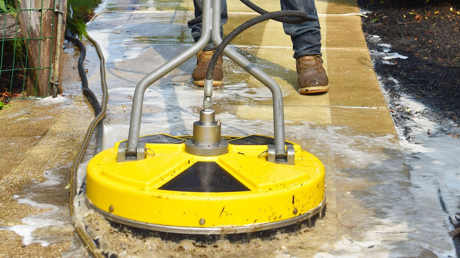 Concrete pressure washing using professional pressure washer