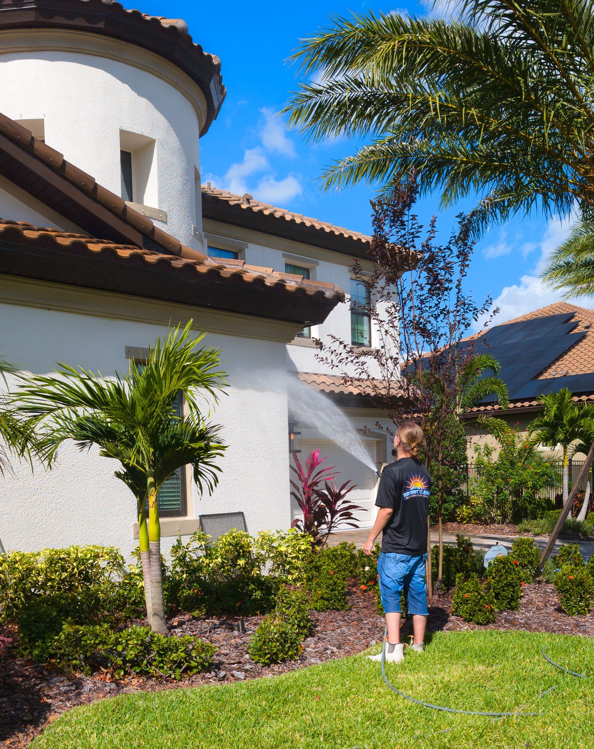 Soft washing a house