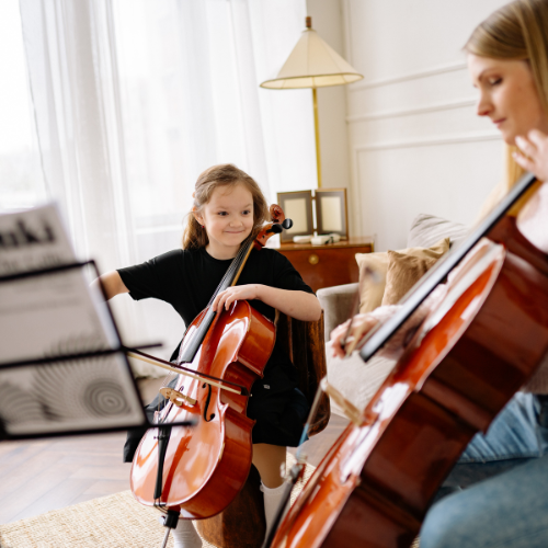 A group of children are playing a game in a music room.
