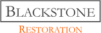 Blackstone Restoration logo with lighthouse icon and black and orange text