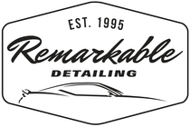 Black-and-white logo for Remarkable Detailing with “EST. 1995” and a stylized car outline