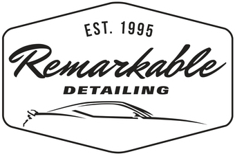Black-and-white logo for Remarkable Detailing with &ldquo;EST. 1995&rdquo; and a stylized car outline
