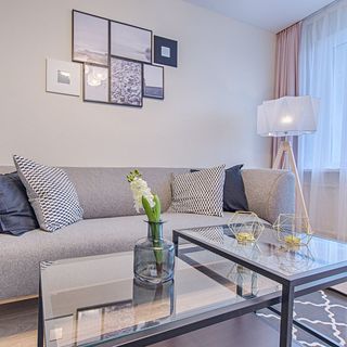 A living room with a couch and a coffee table