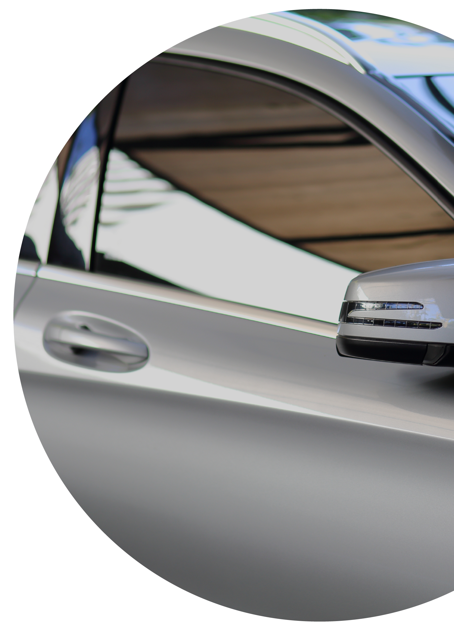 Rear-view mirror closed for safety at car park, Side mirror of gray car , black tinted glass.