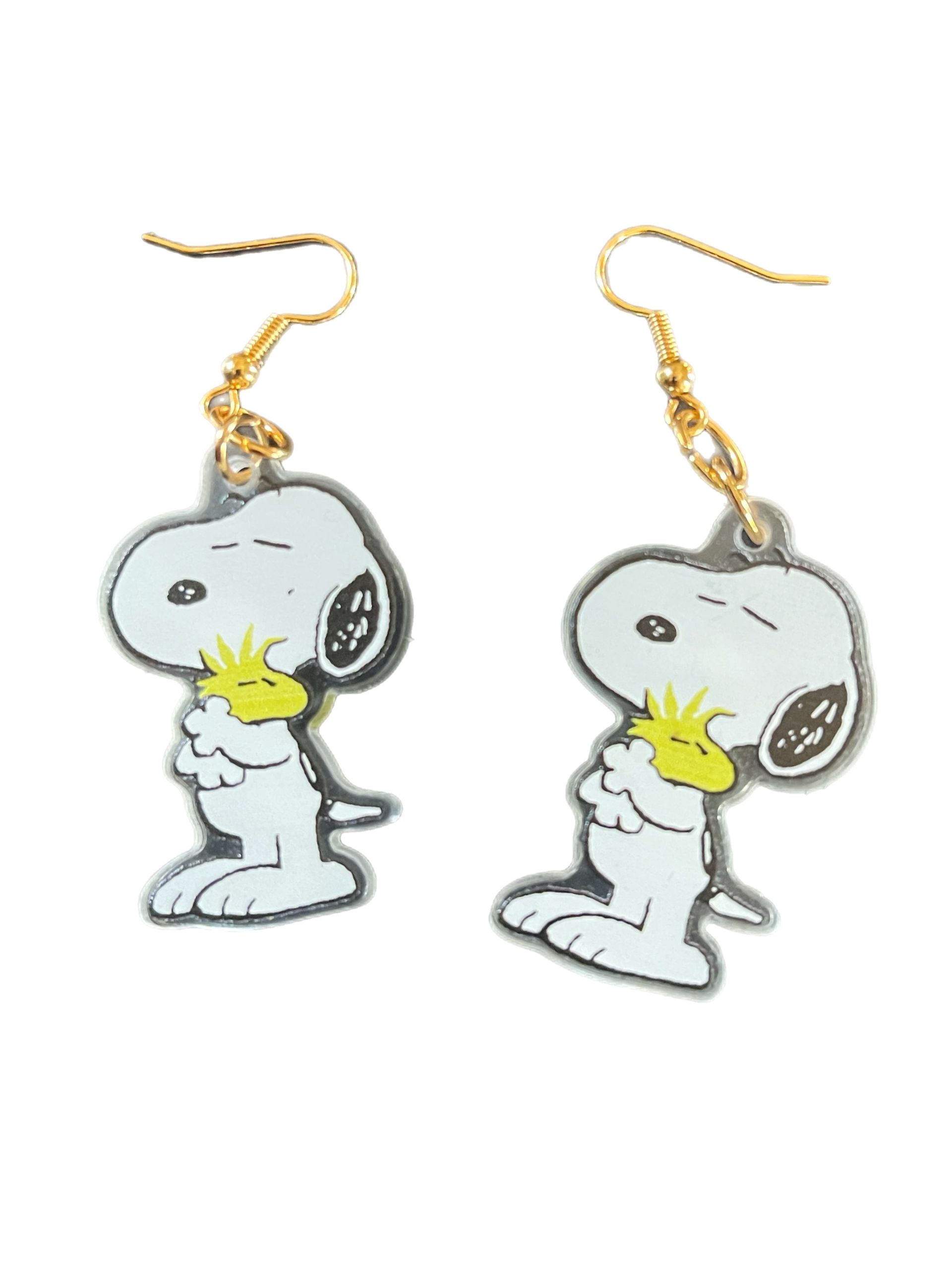 Peanut dog with bird earrings
