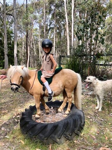 kid on pony