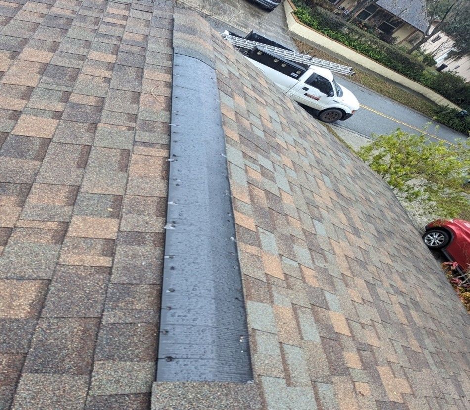 Blown cap on shingle roof