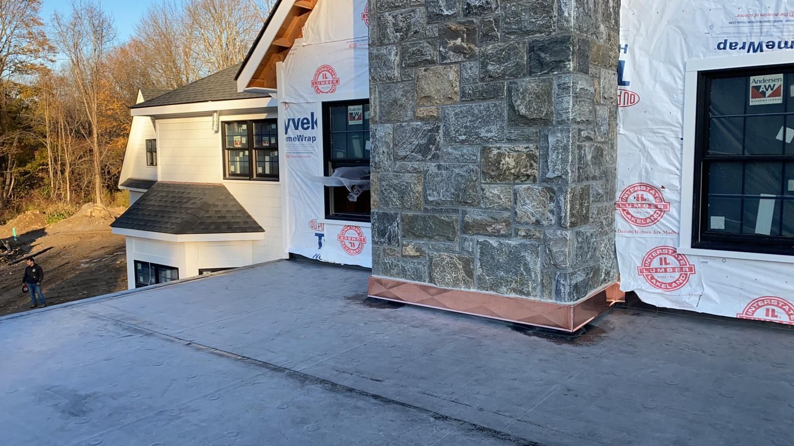A house getting new siding installed
