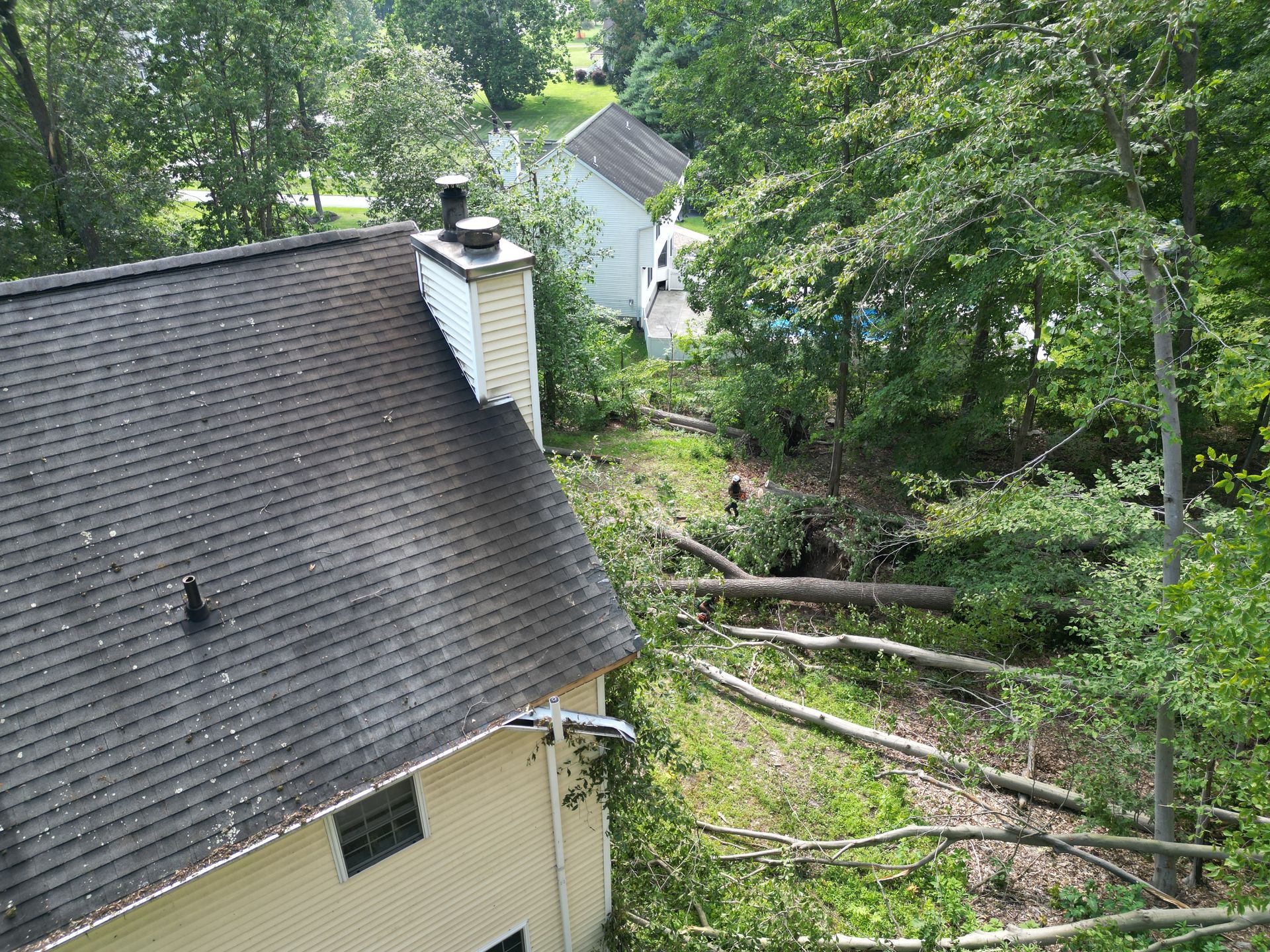 Side view of storm damage to roof