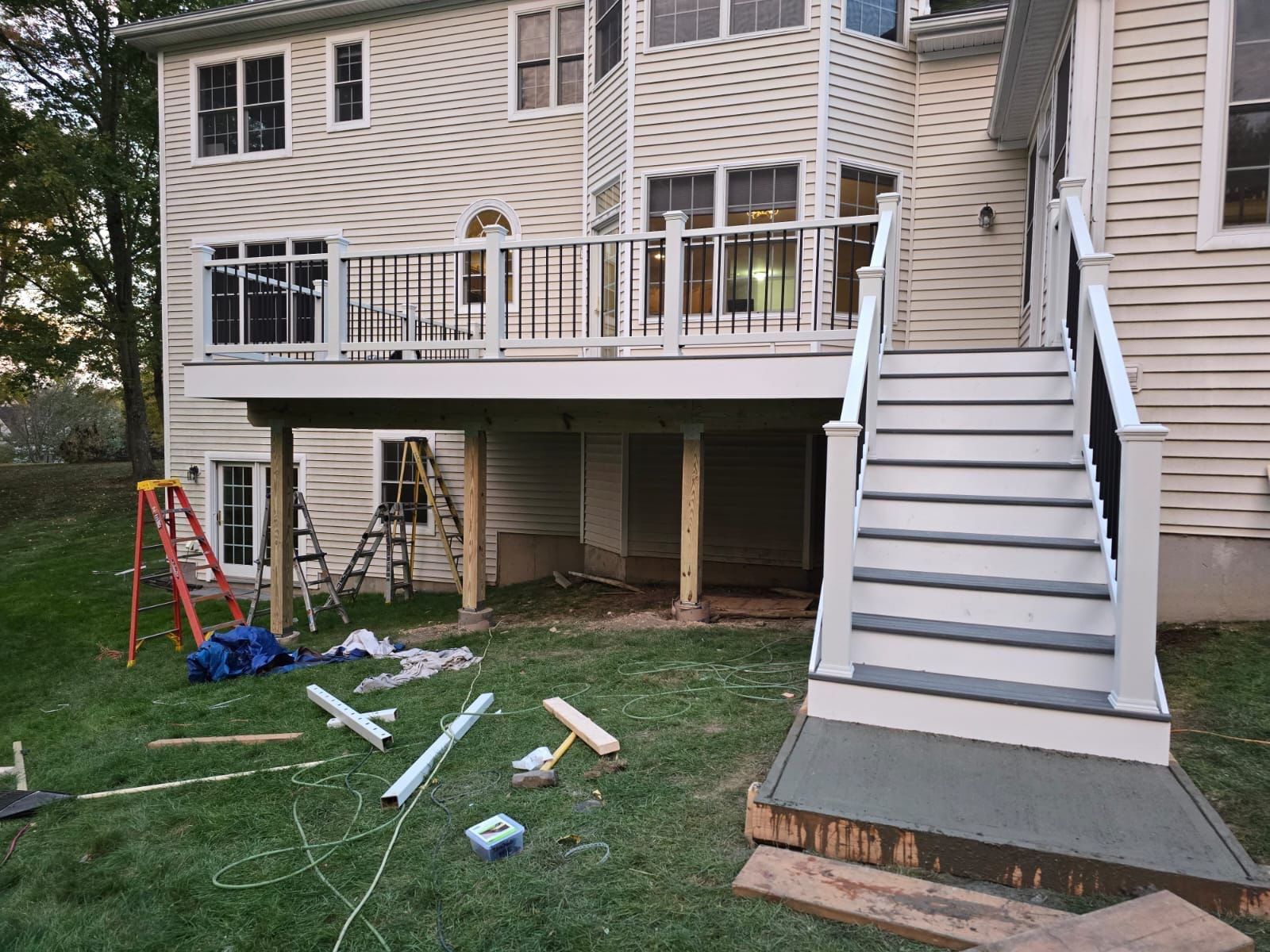 A house with a deck and stairs being built
