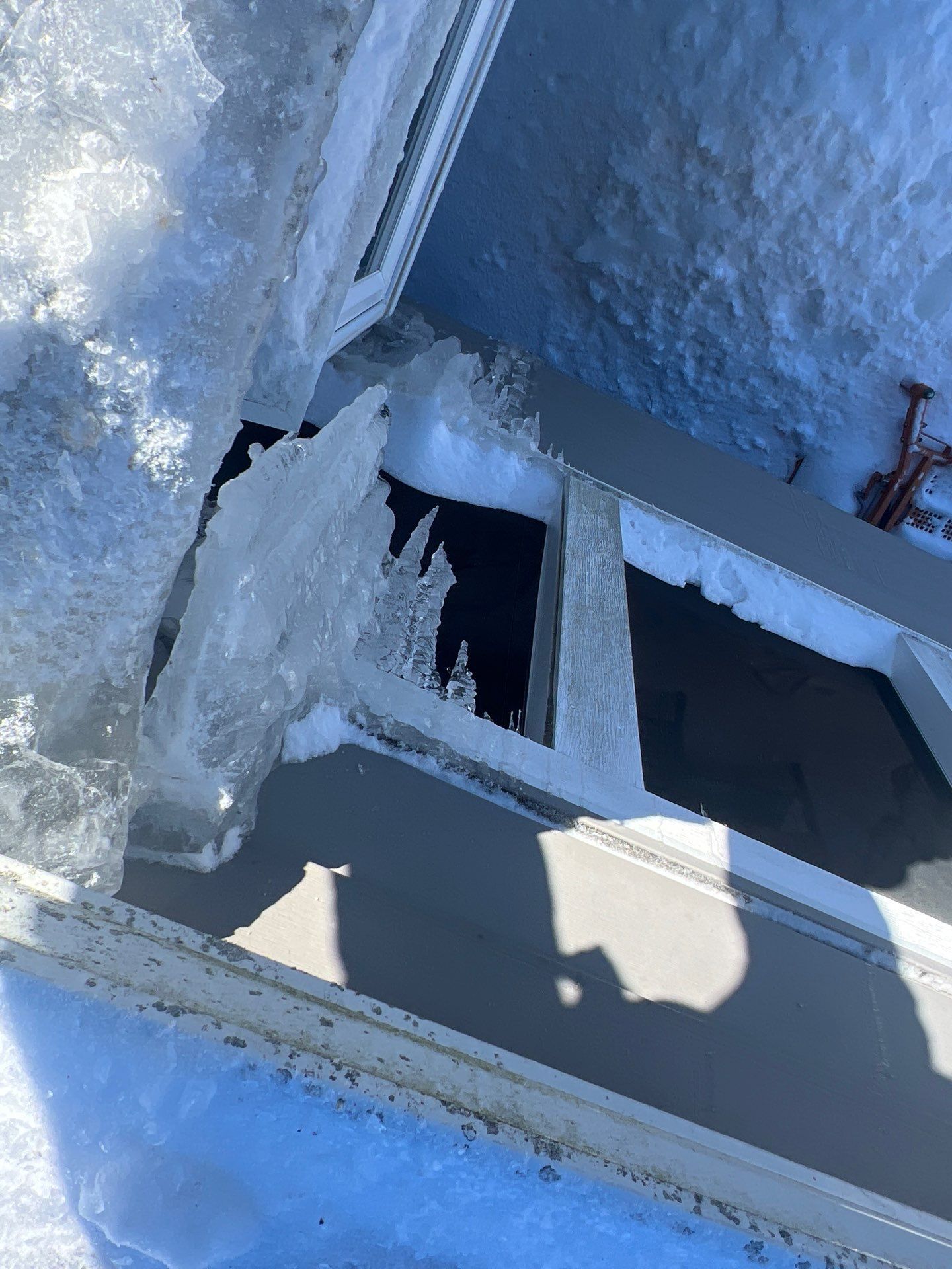 A roof with a skylight installation