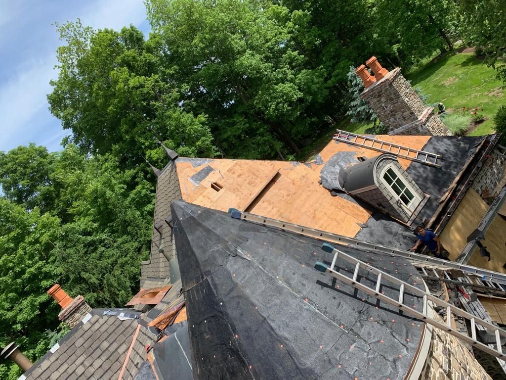Spiral roof being installed with roofing financing