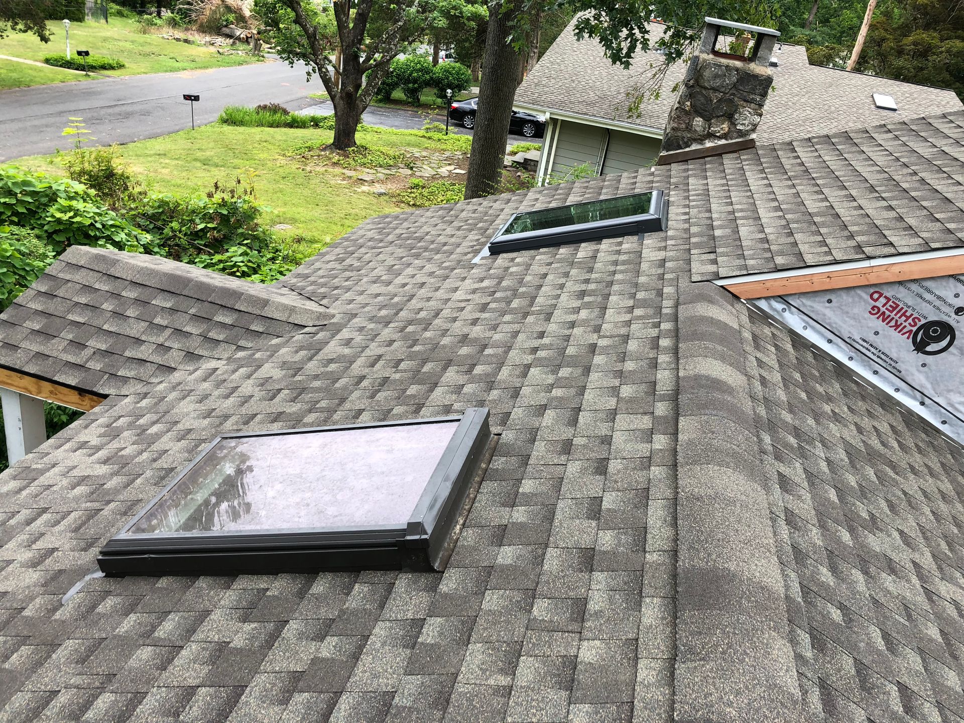There is a skylight installation on a home