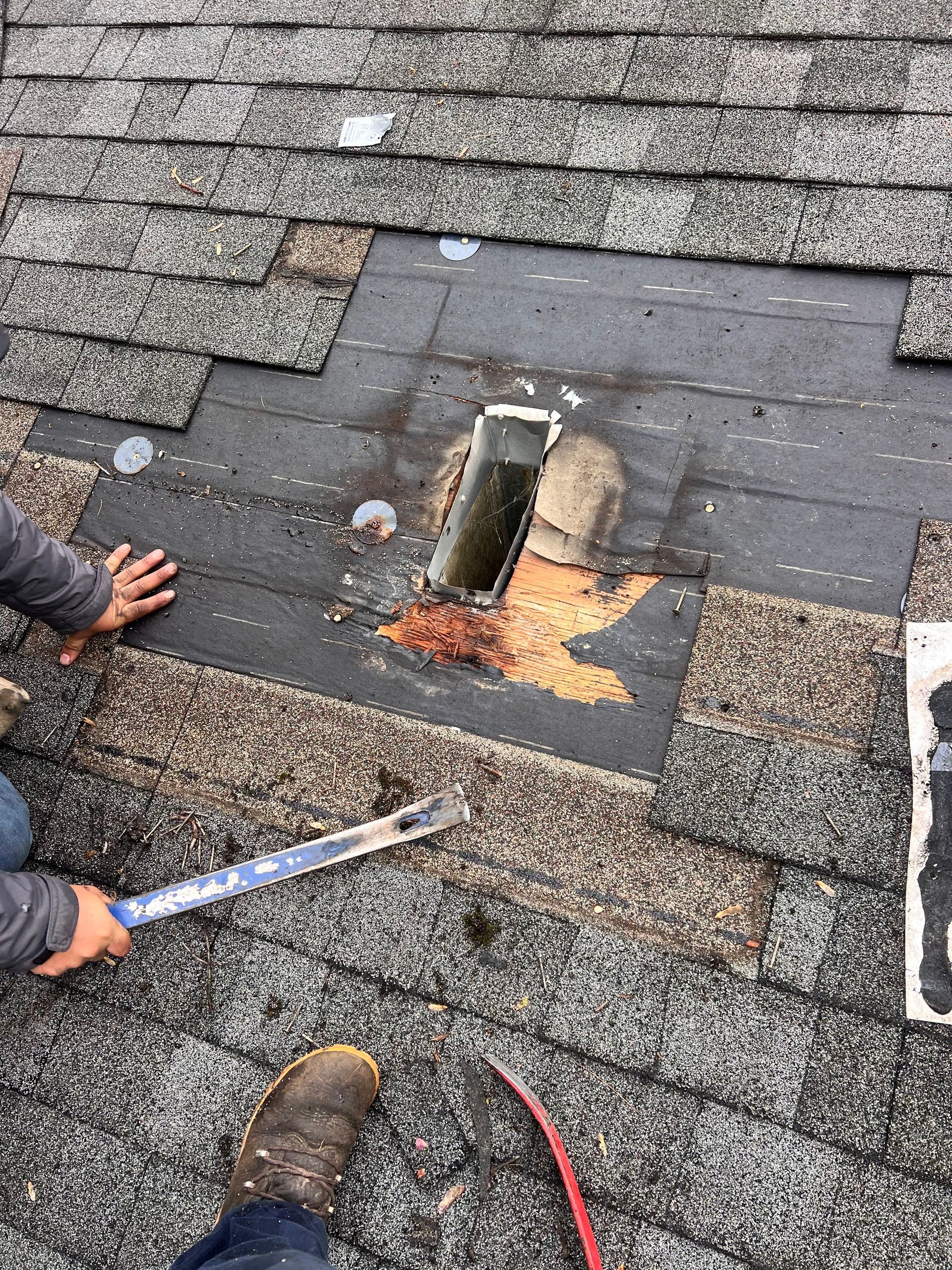 Our team of roofing contractors working on a roof repair