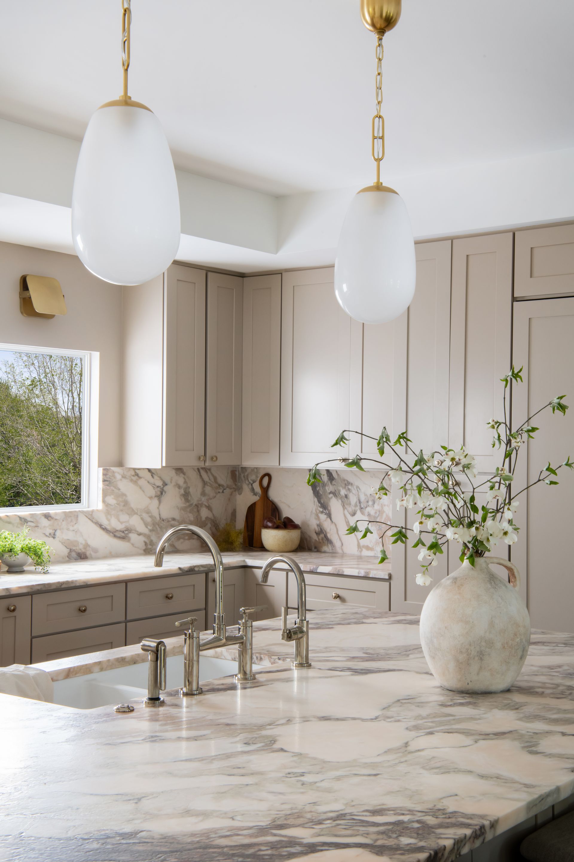 Luxury kitchen remodel featuring calacatta viola marble countertops