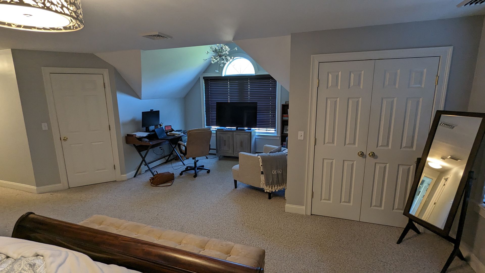 There is a large mirror in the middle of the room.