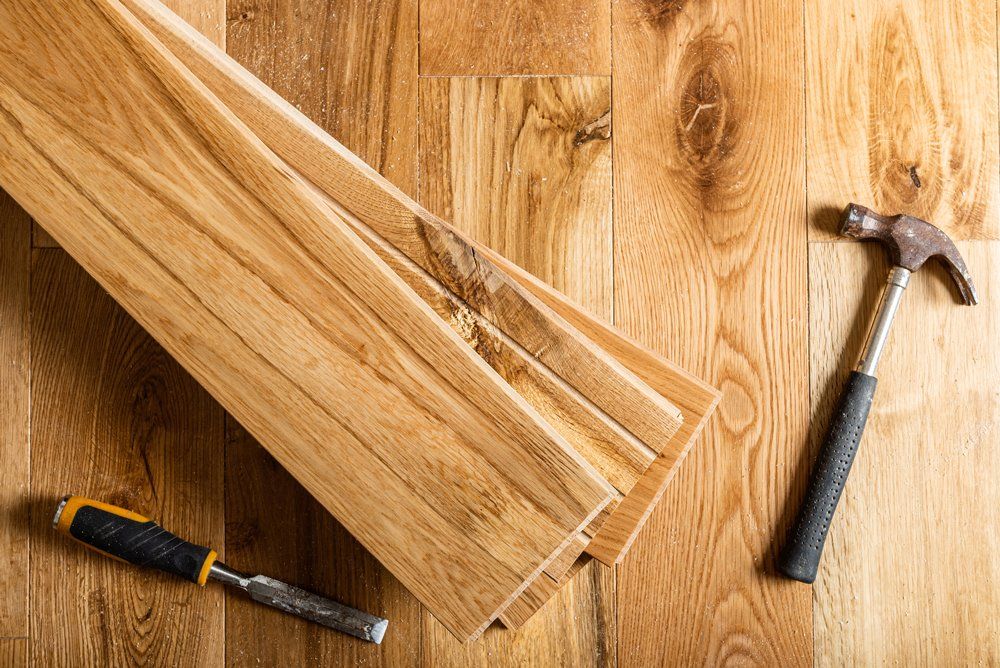 Different Tools on The Wooden Floor — Rochester, MN — Advance Hardware Floor Inc