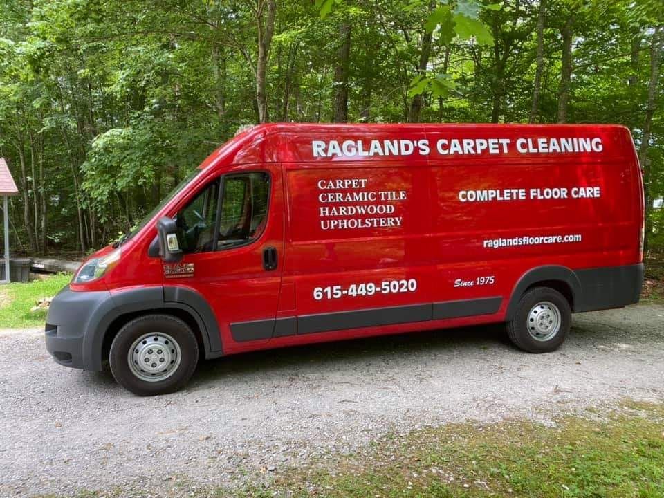 A red van with ragland 's carpet cleaning written on it